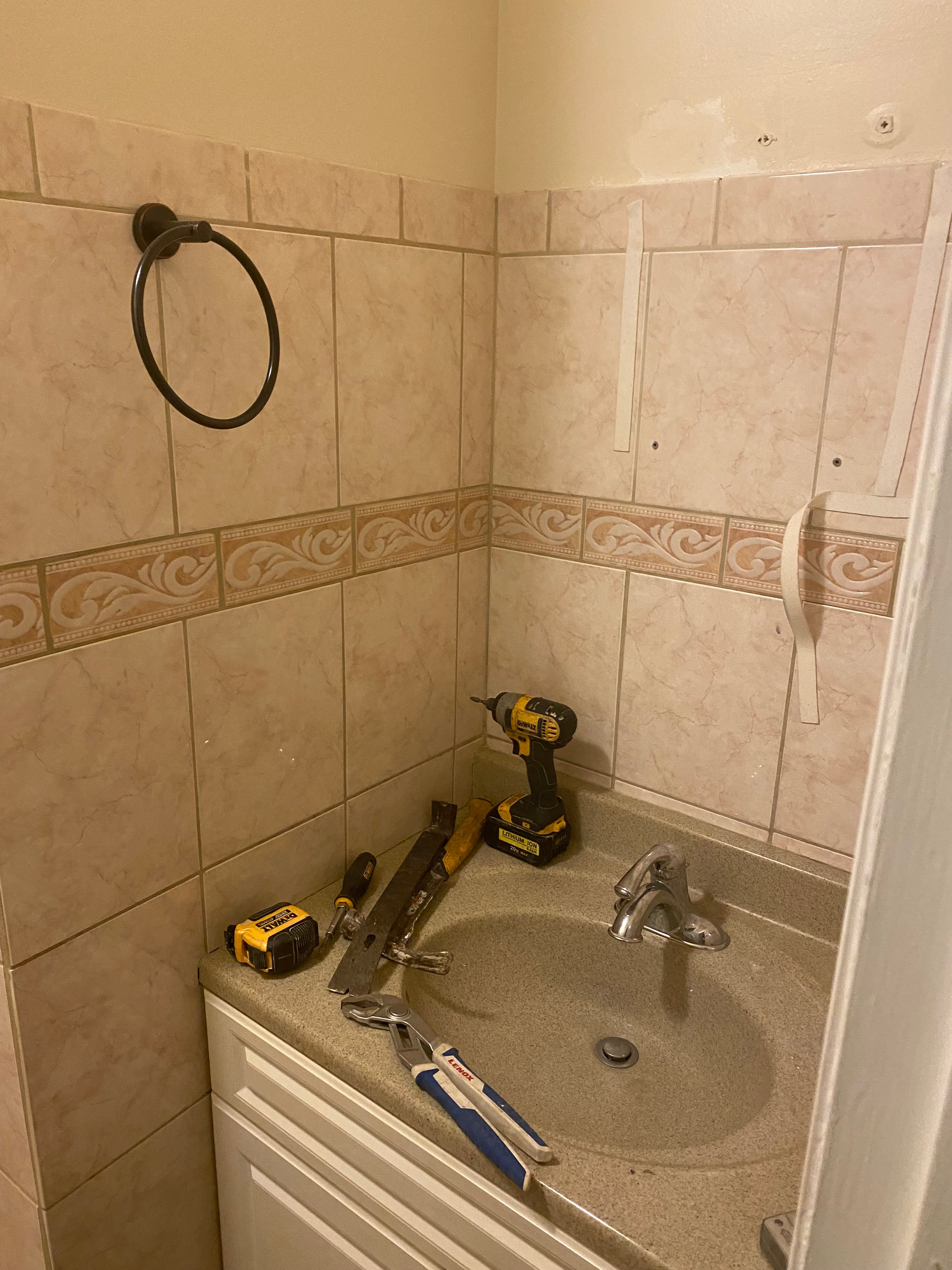 old bathroom vanity and wall tile