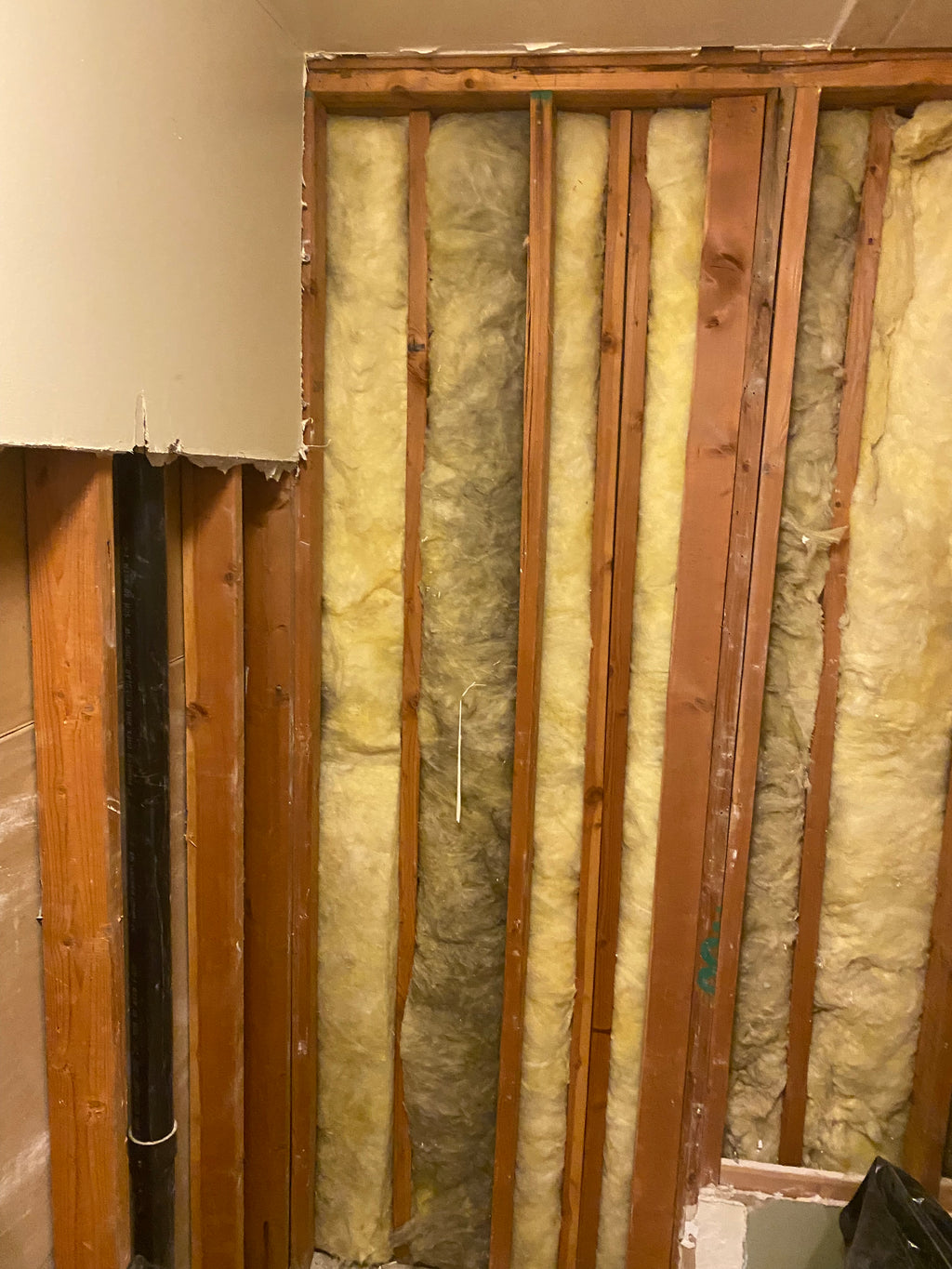 in progress Ceiling with wooden beams and insulation material