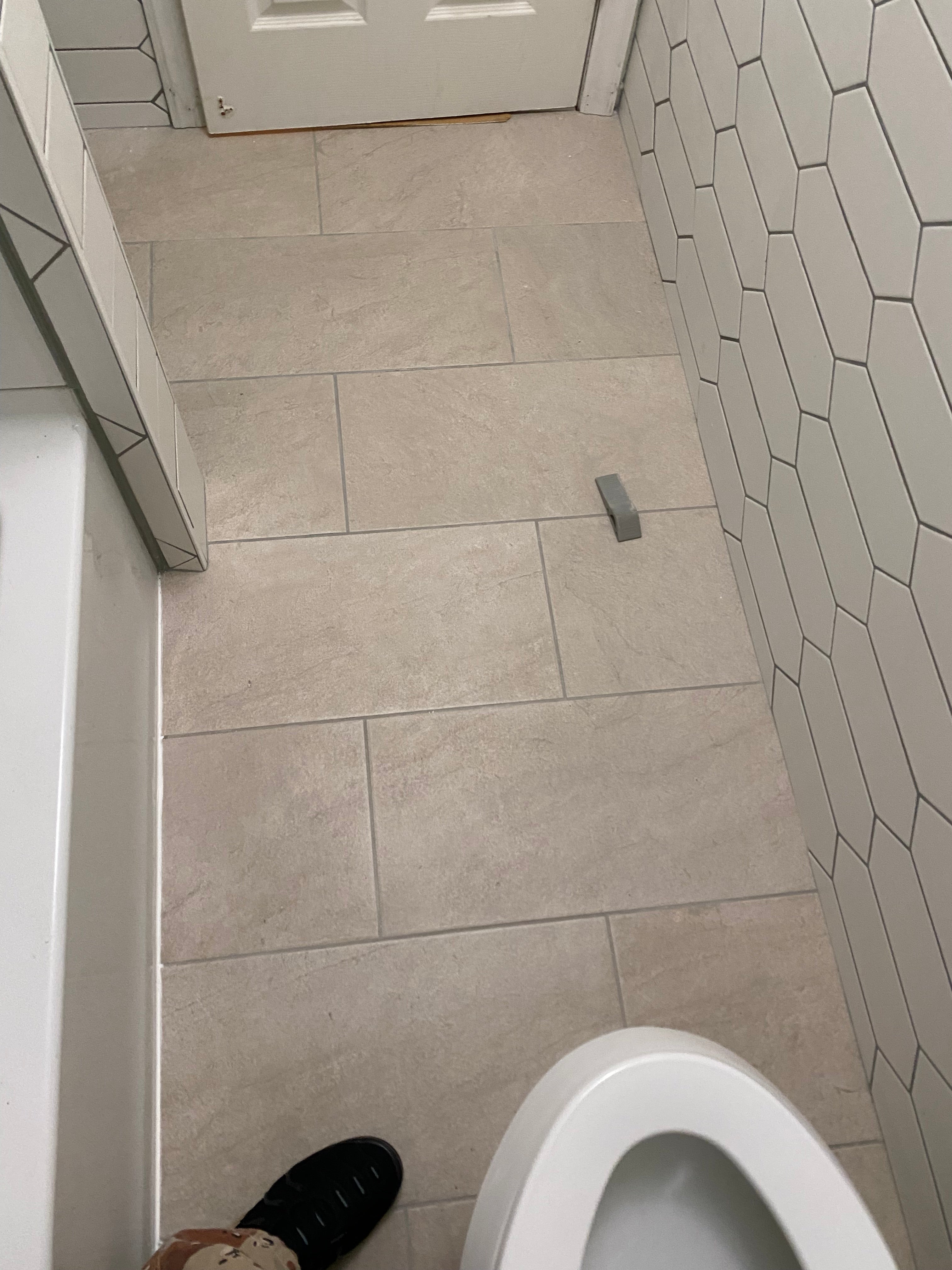 Tiled and grouted bathroom floor