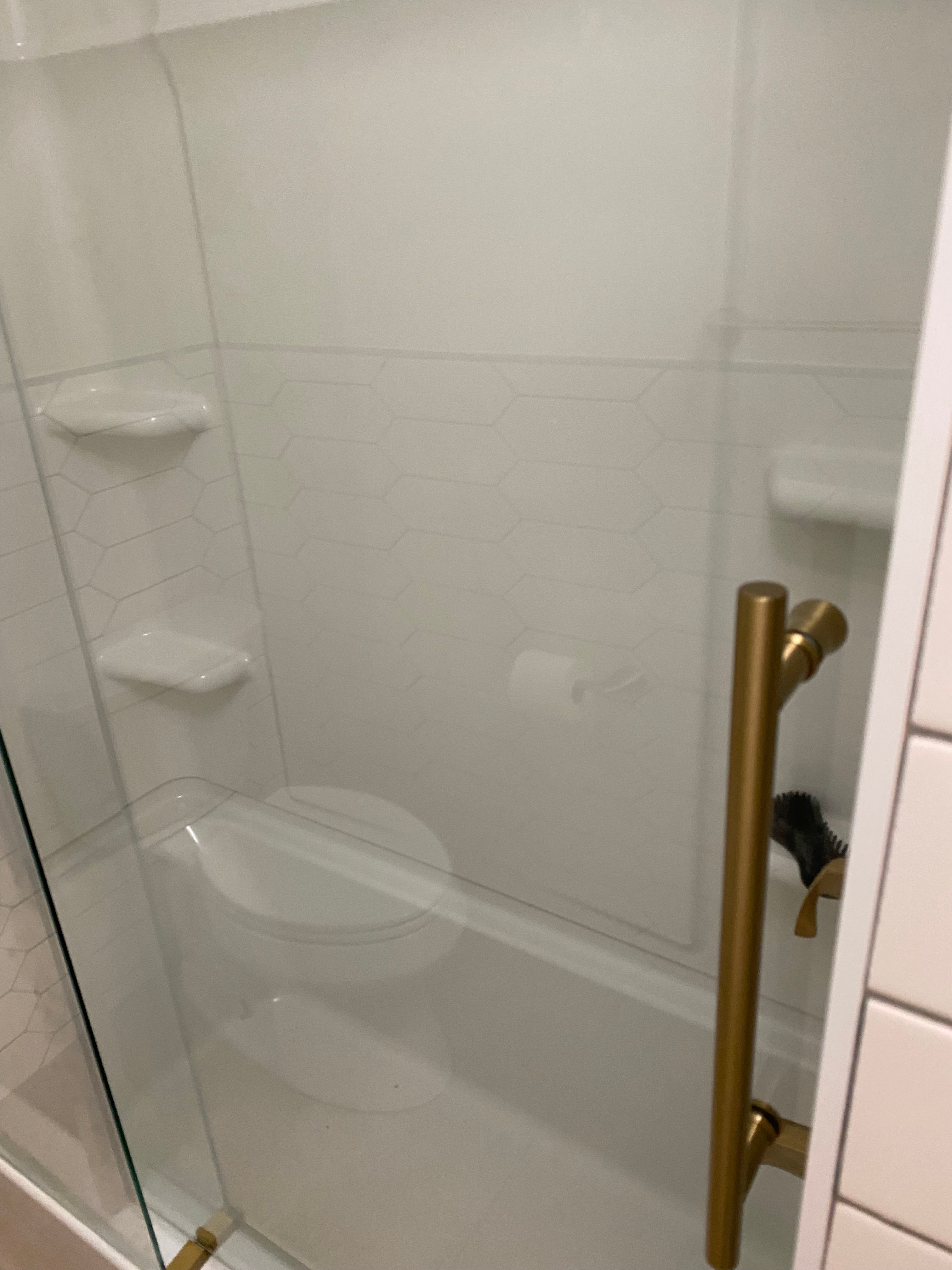 White plastic shower install